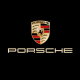 Iconic Porsche logo with four red and four black stripes on a golden background, featuring a horse emblem and three antlers.